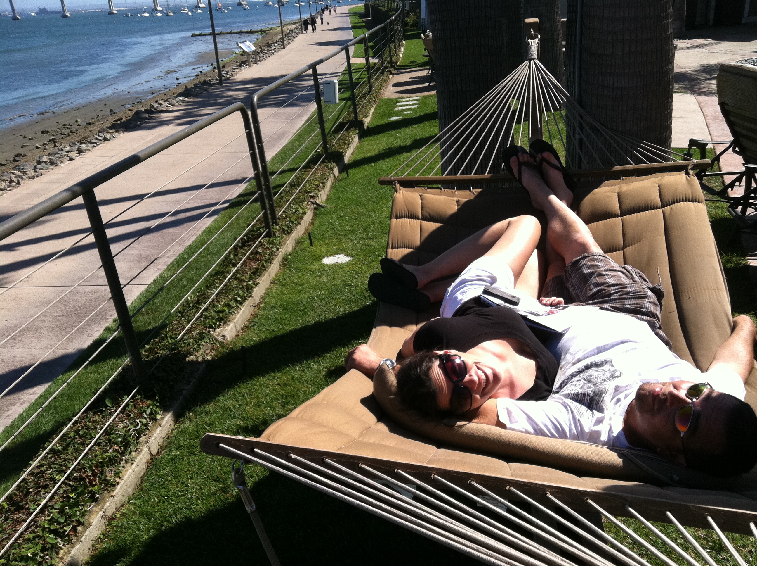 Catching some rays in Coronado Island Marriott's double hammocks.