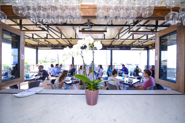 People watching is always in style at the hip new Catania restaurant high atop La Plaza La Jolla.