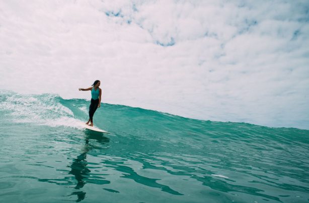 Woman on a surfboard - Top Things to Do in San Diego